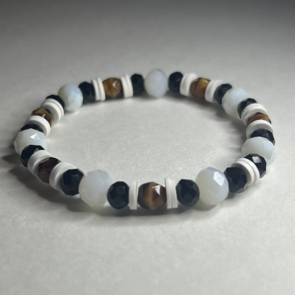 Raccoon inspired bracelet. Brown with black & white beads and rubber beads